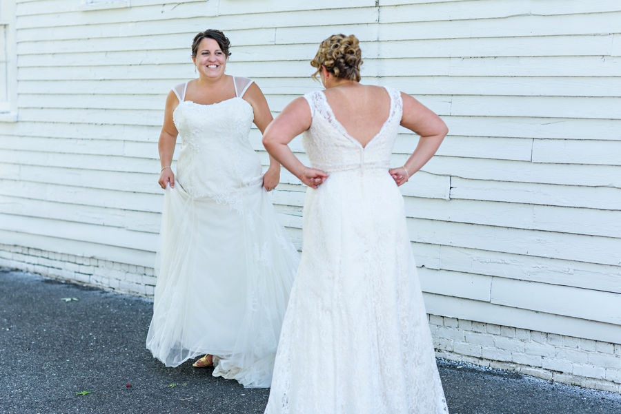Two lesbians seeing each other for the first time before their wedding.